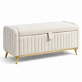 Banc de rangement en tissu bouclé beige avec pieds en métal doré